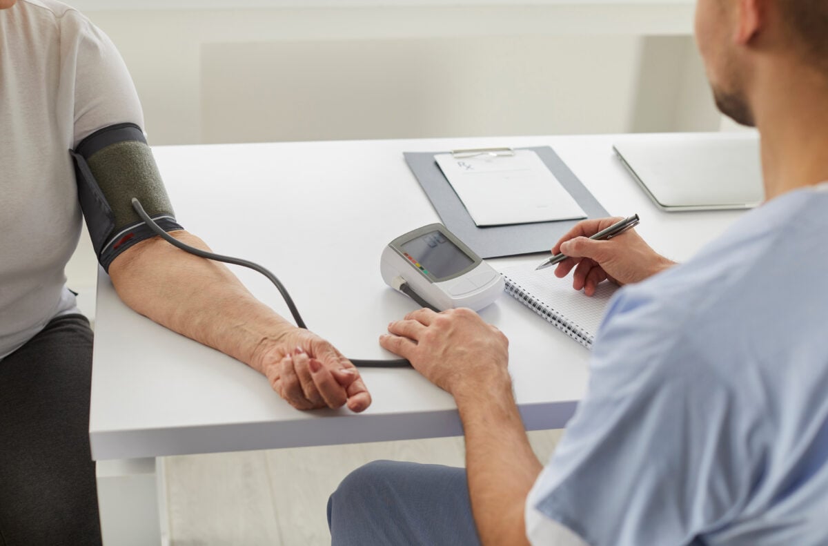 patient gets blood pressure taken