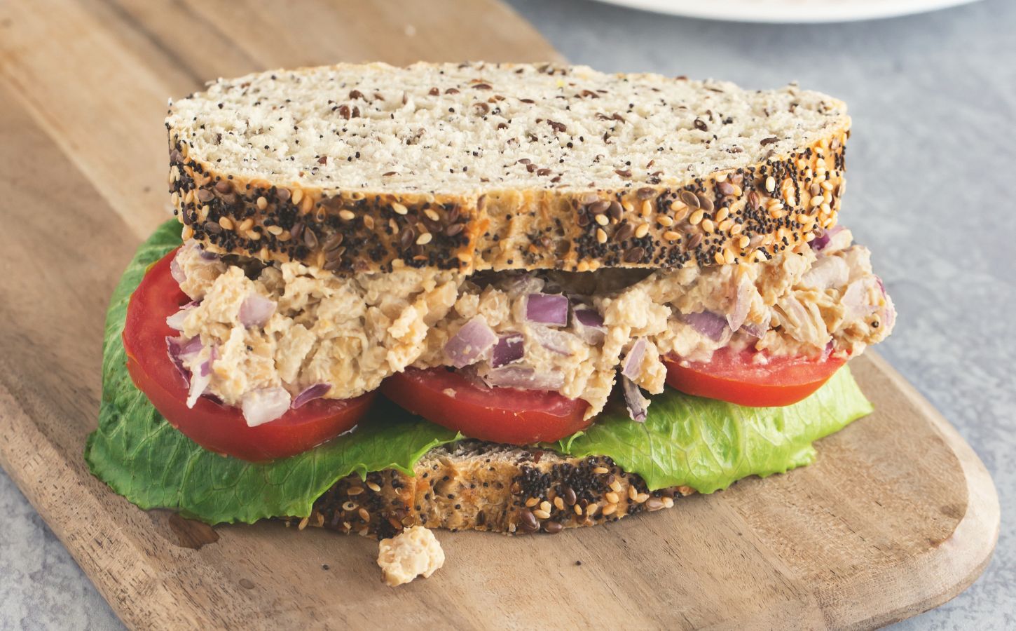 Caesar smashed chickpea sandwiches with tomato and lettuce