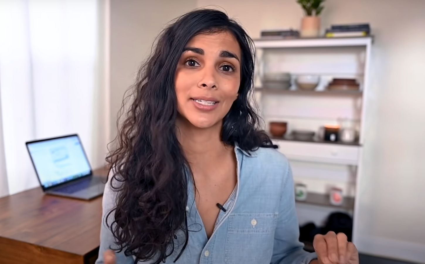 Plant-based YouTuber Nisha Vora in a still from her video on common mistakes vegans make