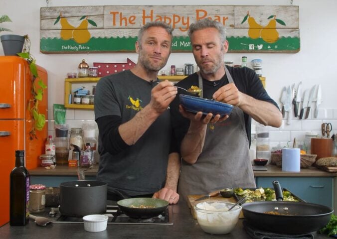 Plant-Based YouTubers David and Stephen Flynn from The Happy pear making a vegan nourish bowl