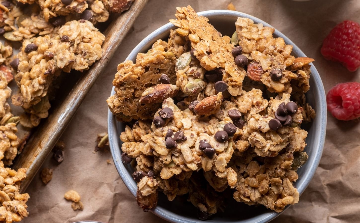vegan oatmeal cookie granola with dairy free chocolate chips, almond butter, and seeds