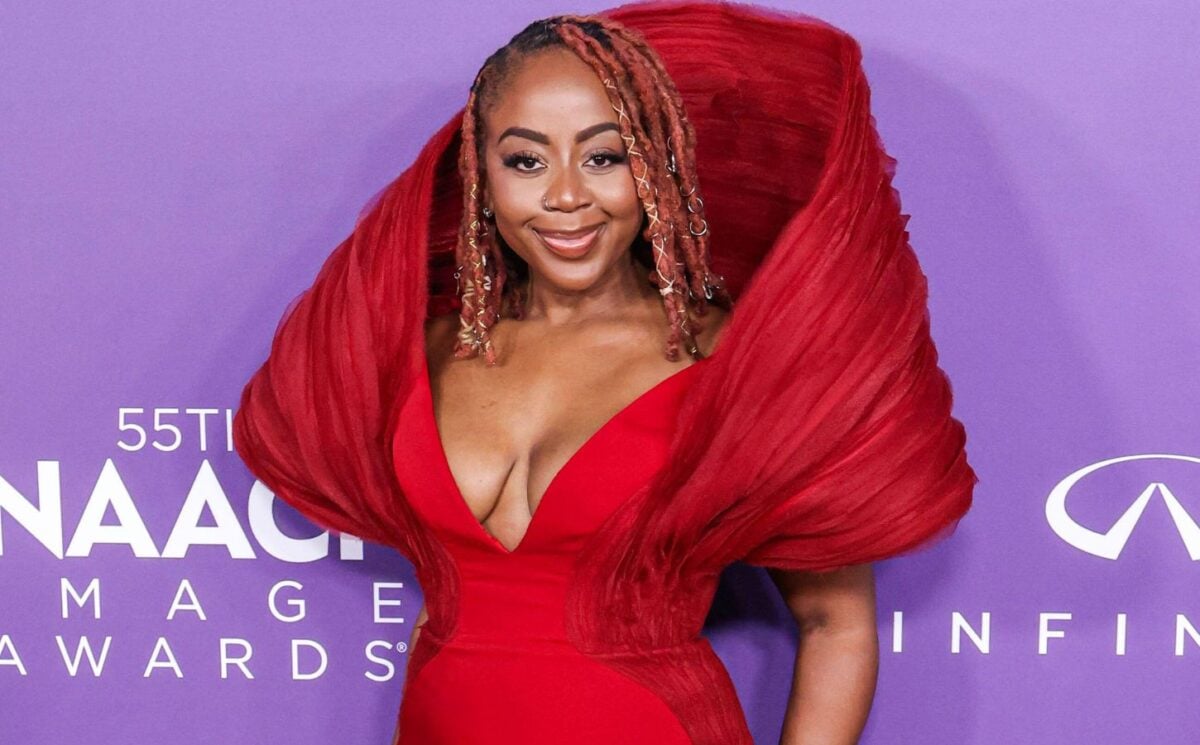 Slutty Vegan founder Pinky Cole Hayes on the red carpet in a red dress