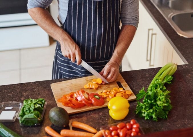 person preparing vegetables
