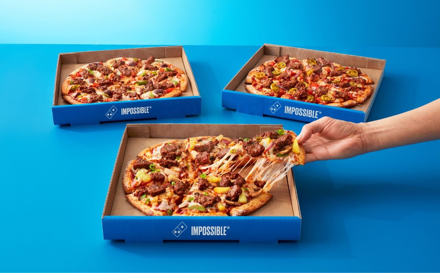three Domino's pizzas made from Impossible beef