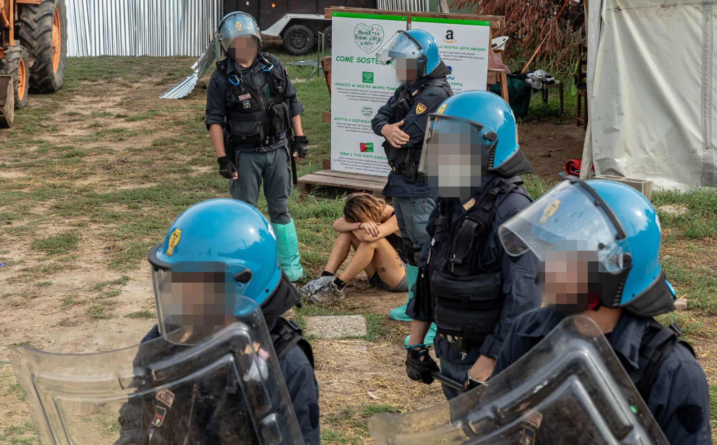 Italian police at a sanctuary where nine pigs were killed