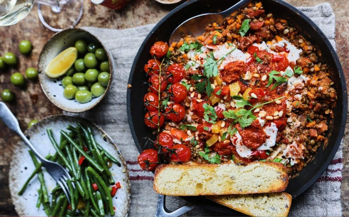 A large plate of Spanish white wine lentils, a vegan date night dinner idea
