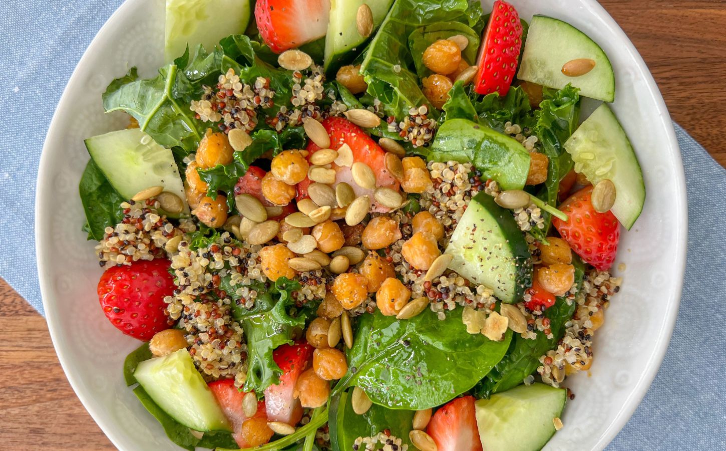 strawberry quinoa salad with chickpeas, kale, and spinach