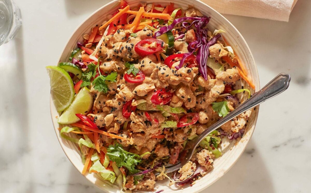 satay chickpea and quinoa salad with veggies and lime