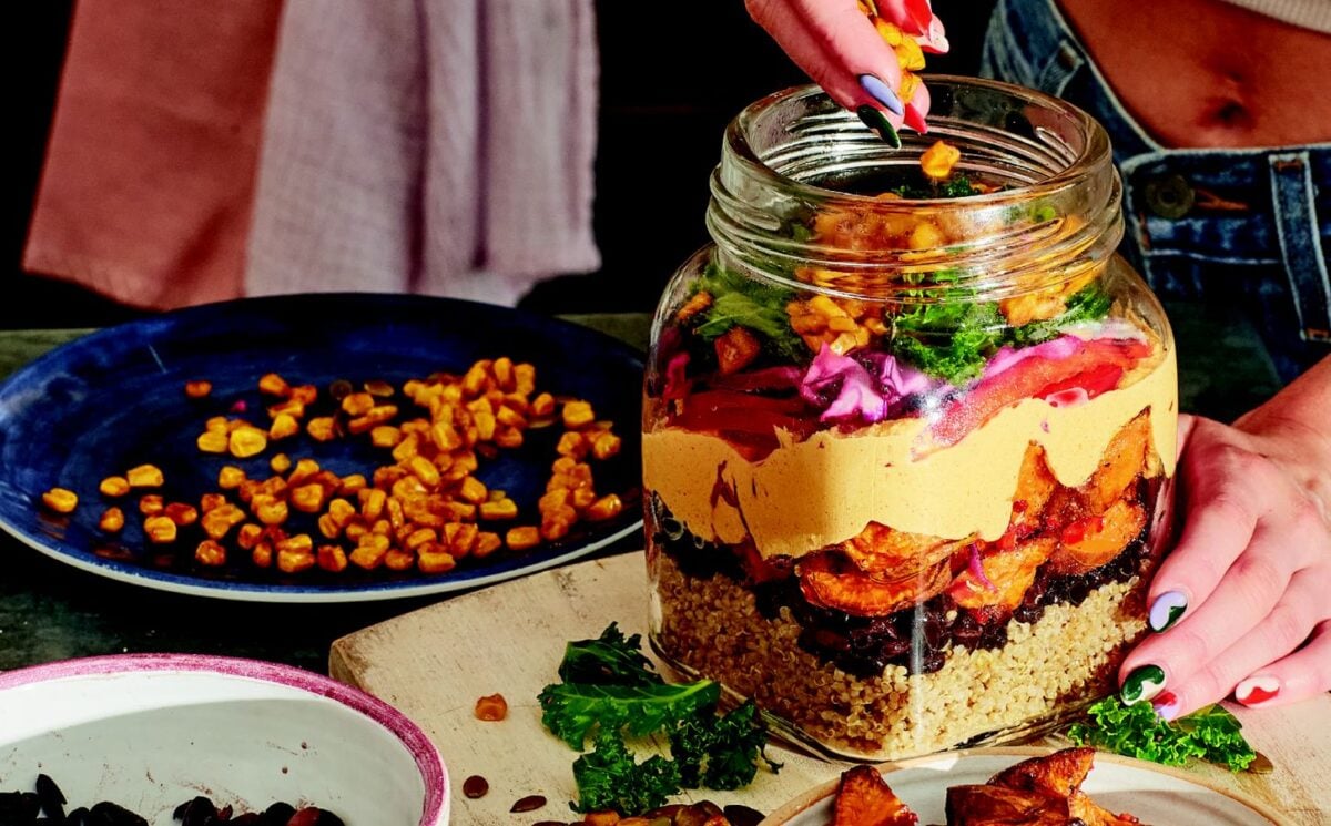 sweet potato rainbow salad with quinoa, corn. and cabbage