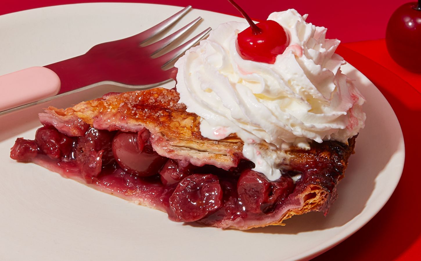 vegan cherry pie with sour cherries and vegan whipped cream